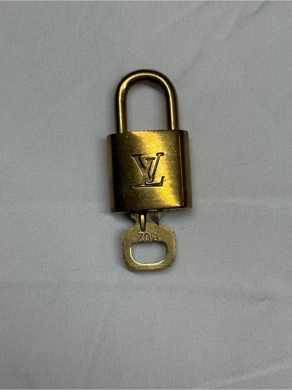 Louis Vuitton Gold Padlock and Key Accessory #302